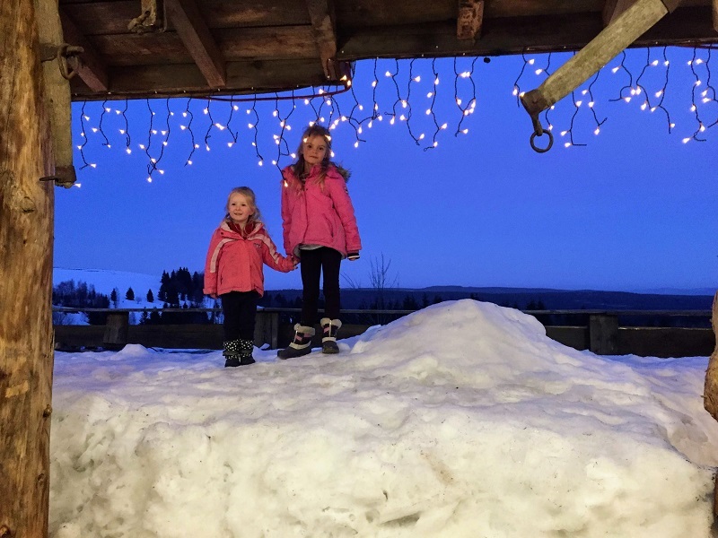 How to go skiing on a budget at this cheap family ski resort - sparkly lights