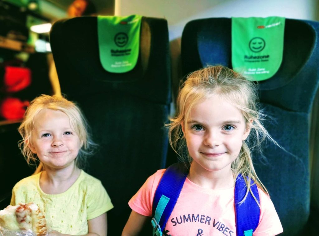 Our kids on the train on our 2 week Eastern Europe itinerary
