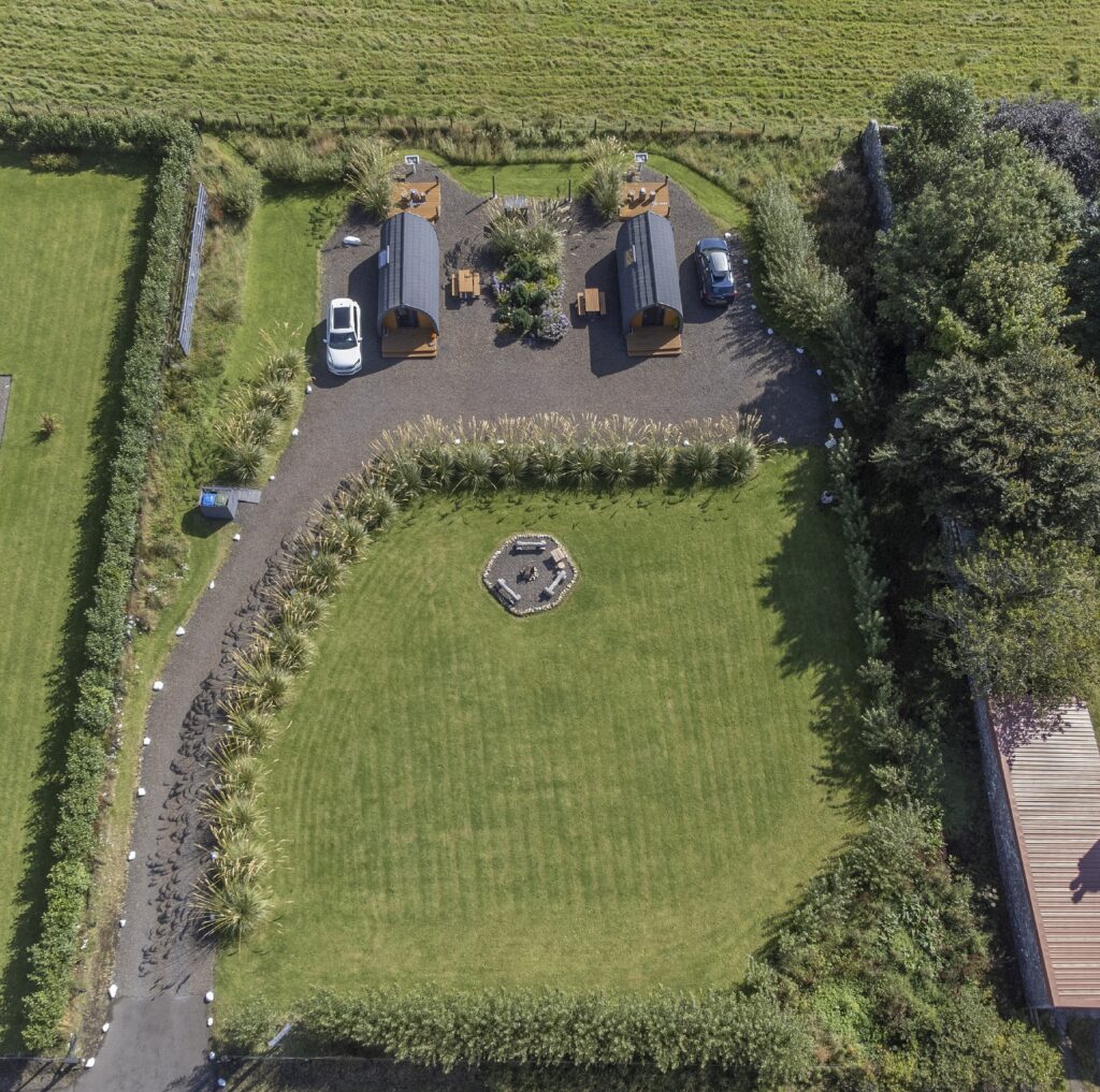 Aerial shot of North Star Glamping, showcasing its secluded location and scenic surroundings along the North Coast 500 route.