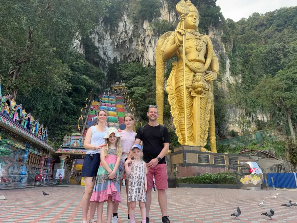 Our family at Batu Caves, a key stop on a 2 week Malaysia itinerary