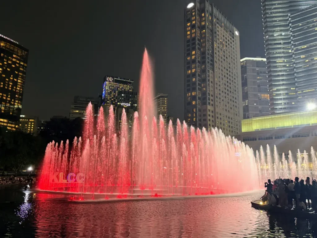 KLCC Symphony Lake Water Show in Kuala Lumpur, with illuminated fountains and city skyline—an evening highlight on our Malaysia itinerary.