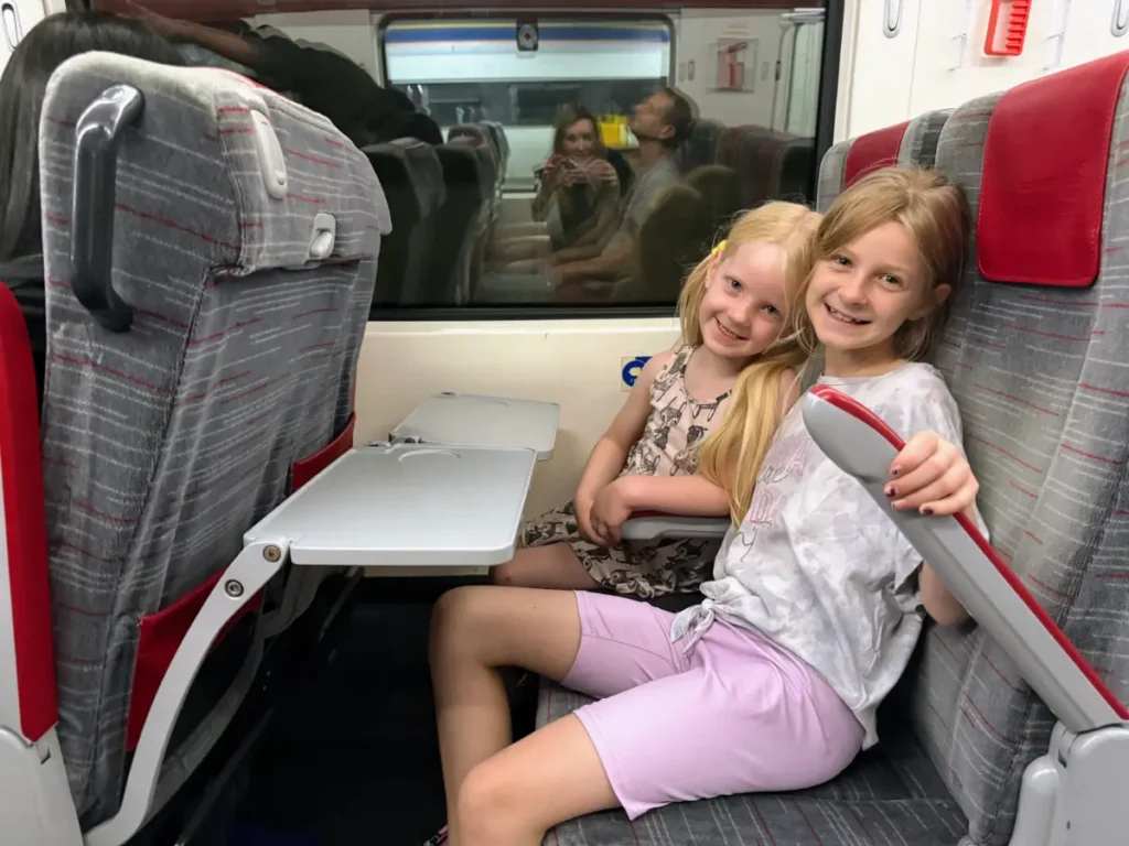 Our kids seated on the train from Kuala Lumpur to Penang