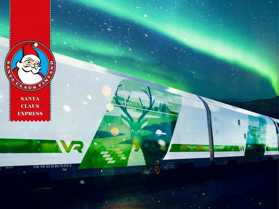 Santa Claus Express train with the Northern Lights in the background
