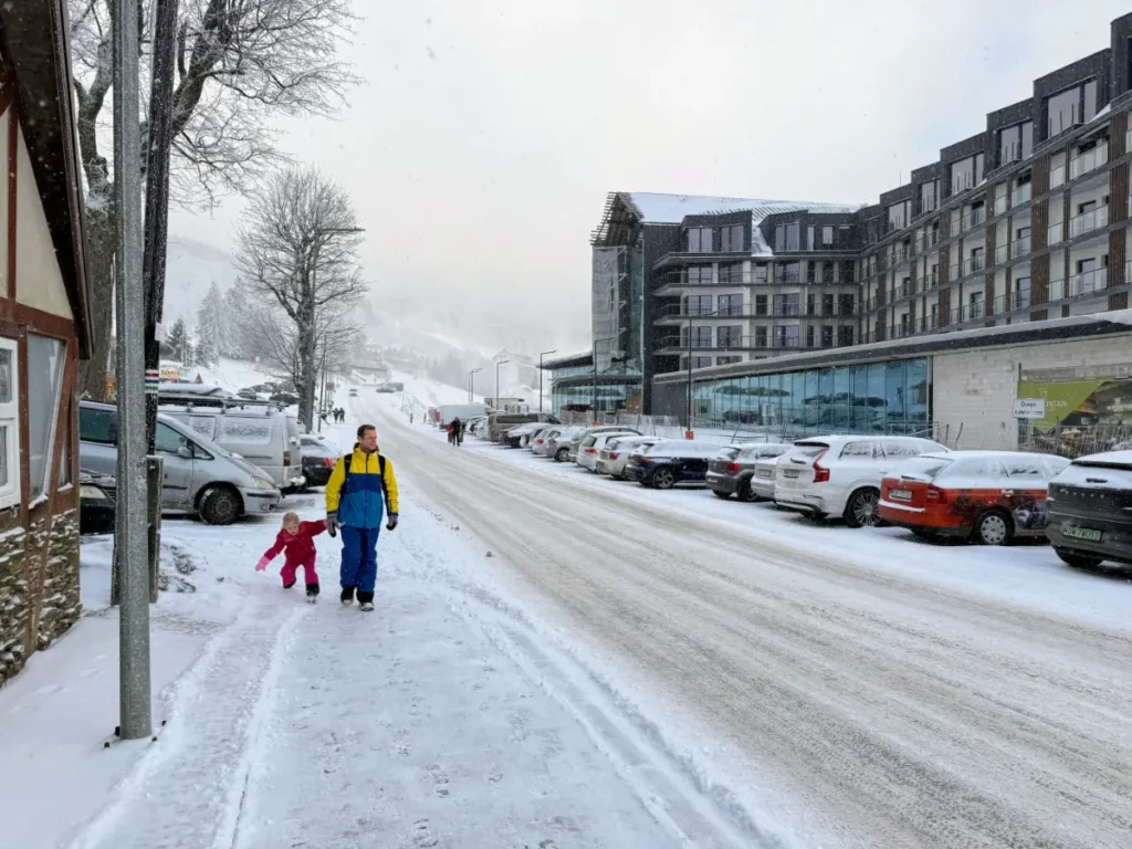 Main road through Zieleniec with ski hotels and accommodation at this beginner ski resort in Poland