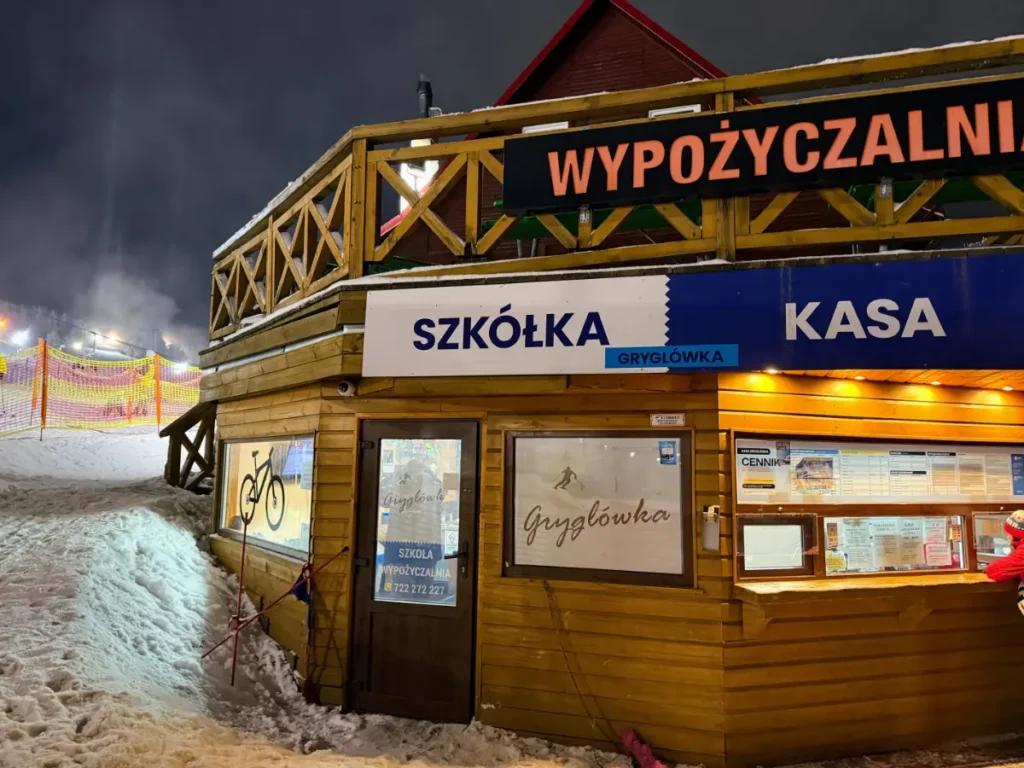Ticket office at Zieleniec Ski Arena, where families can buy ski passes at this beginner ski resort in Poland
